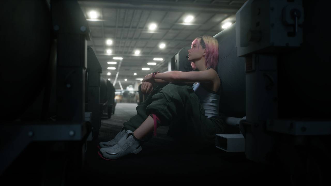 Ace Combat 8: Wings of Theve cutscene of Tasha Severskaya sitting alone in hangar bay