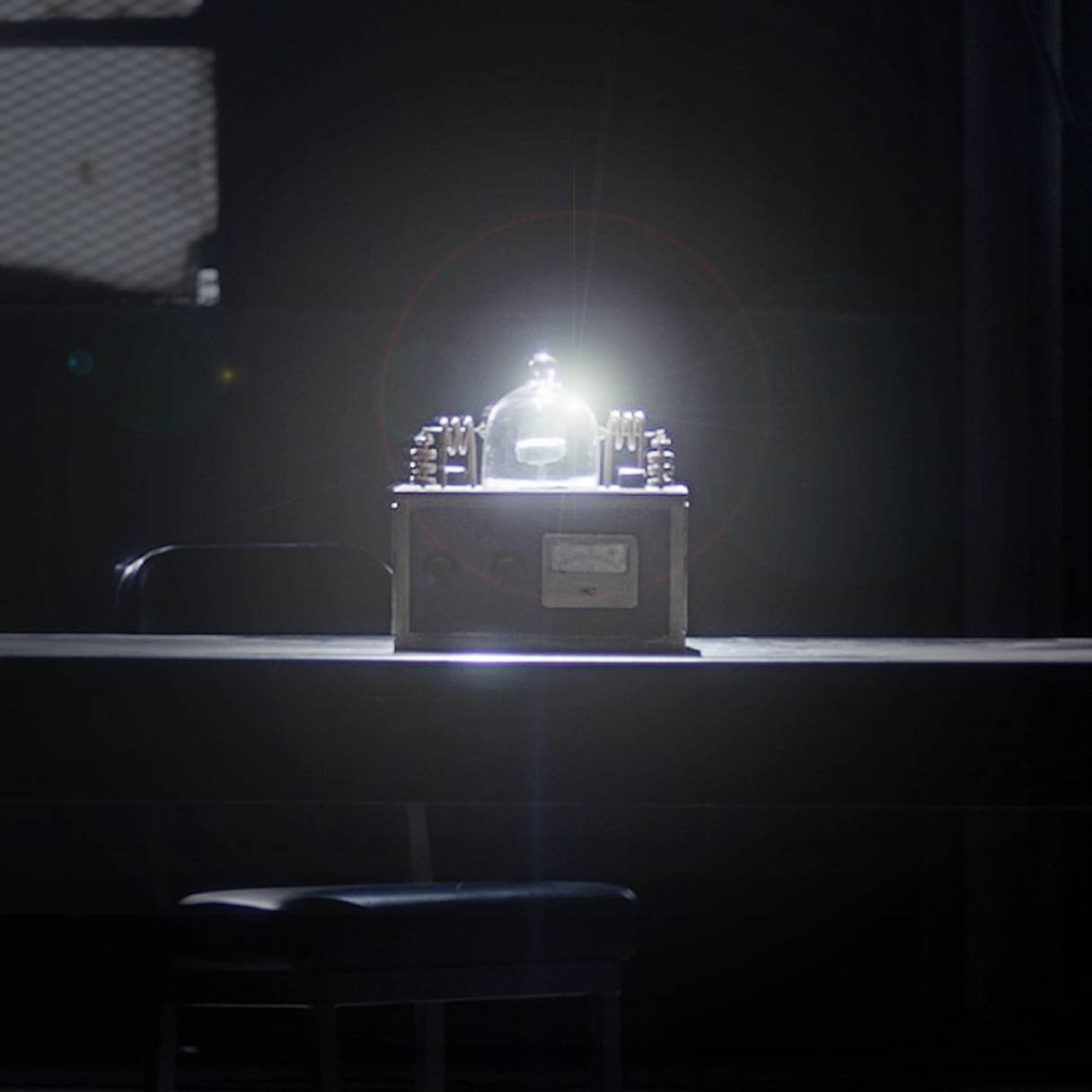 Unknown 9: The Taylor Files' Dr. Waylan Taylor sits in his wheelchair, across from a subject in his interrogation room.